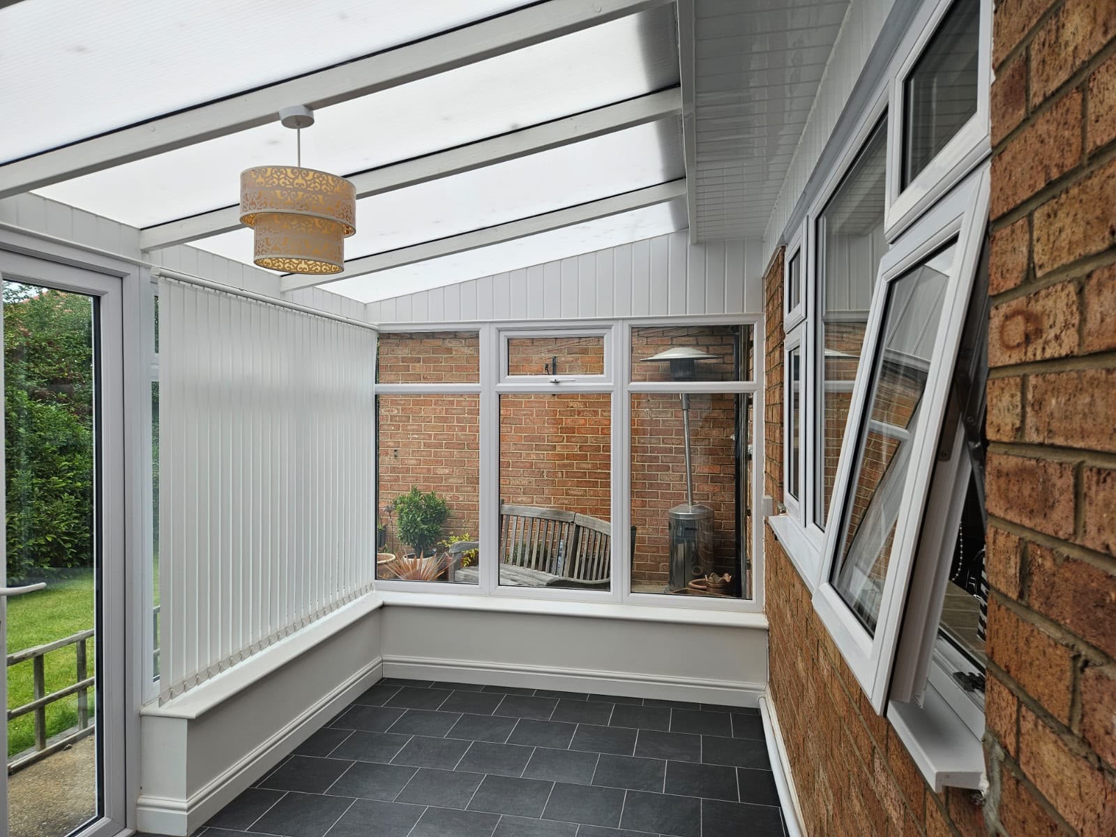 Before — the old conservatory looking towards the garden