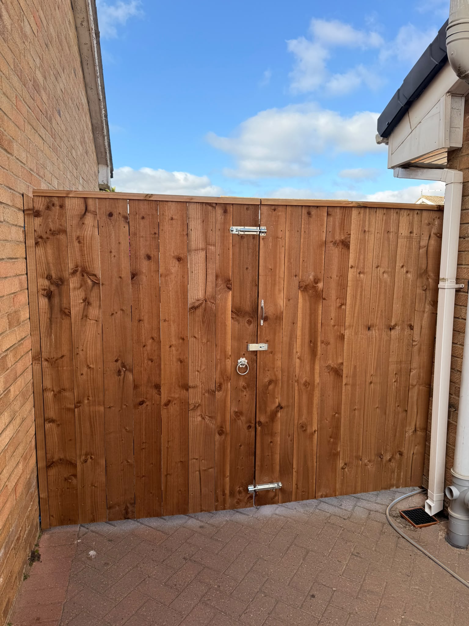 The gates in position across the driveway