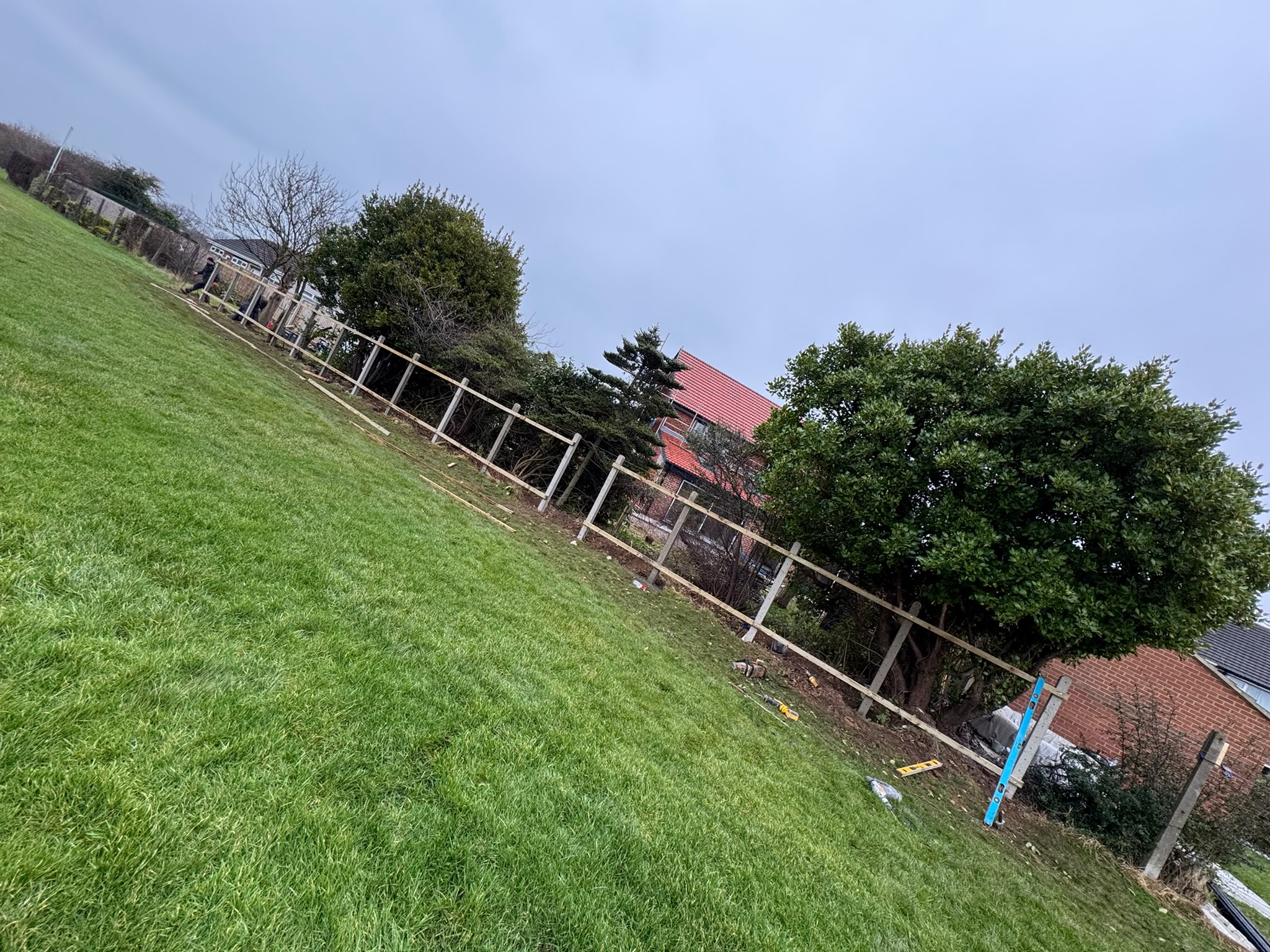 The new fence line going in along the garden