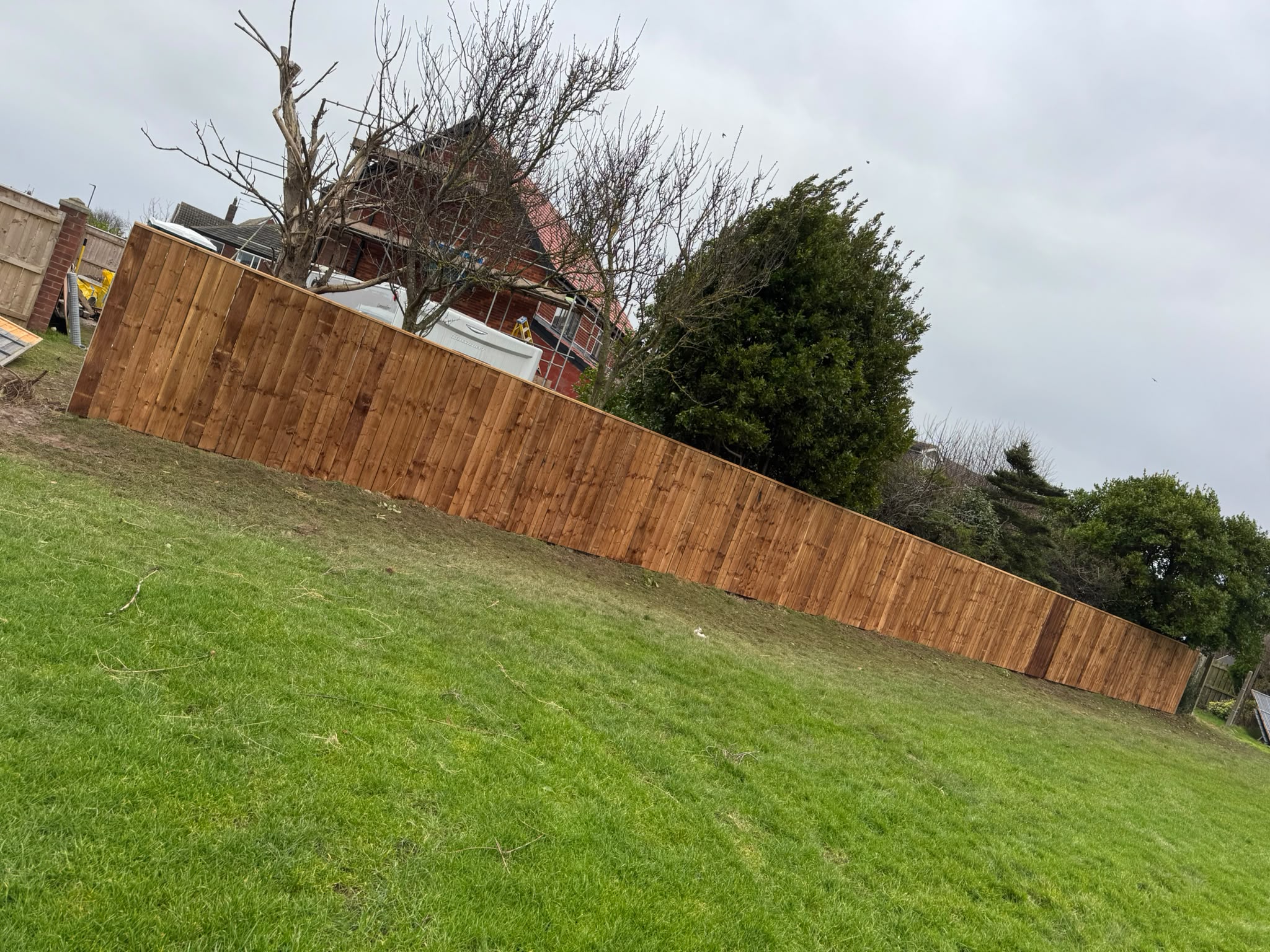 The completed 27 metre closeboard fence run backing onto Redcar racecourse